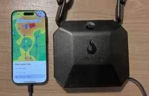 An iPhone displaying the Hanima Onsite app with a WiFi heatmap alongside an Oscium Nomad antenna device, illustrating the use of the device to visualize and analyze wireless network signals.