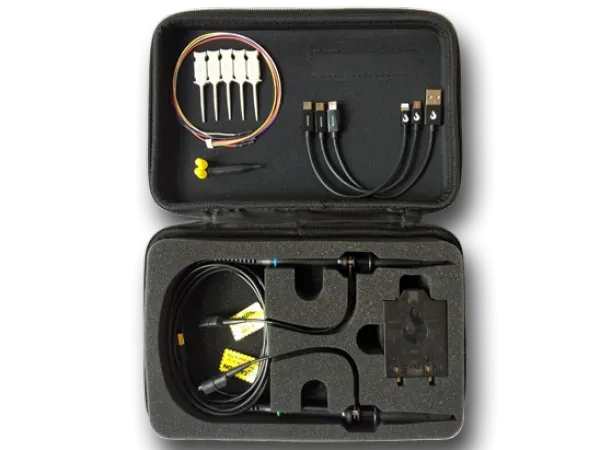 An open carrying case containing Oscium Wi-Pry devices and associated cables, showcasing the tools for radio frequency analysis and monitoring.