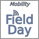 Mobility Field Day logo featuring the word “Mobility” in gray italic text above “Field Day” in bold blue lettering, with a stylized wireless‑signal icon above the word “Field.”